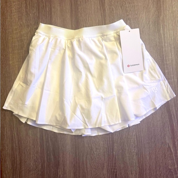 lululemon athletica Dresses & Skirts - New with tags Lululemon Narrow waistband tennis skirt, White, size 4.